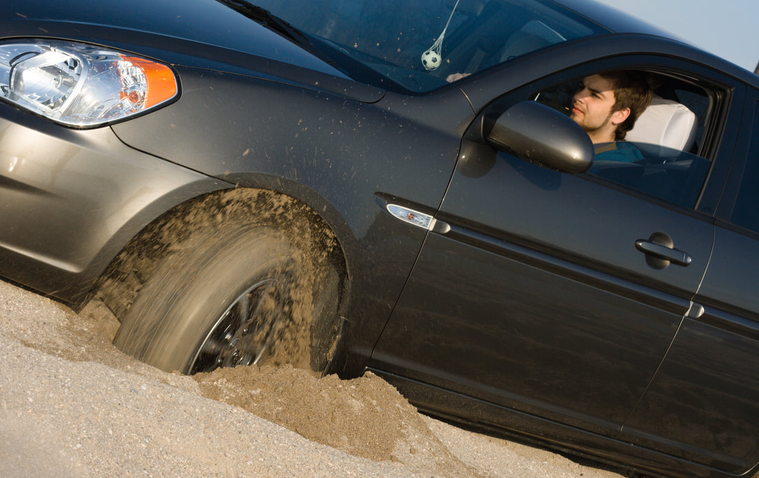 car stuck in sand