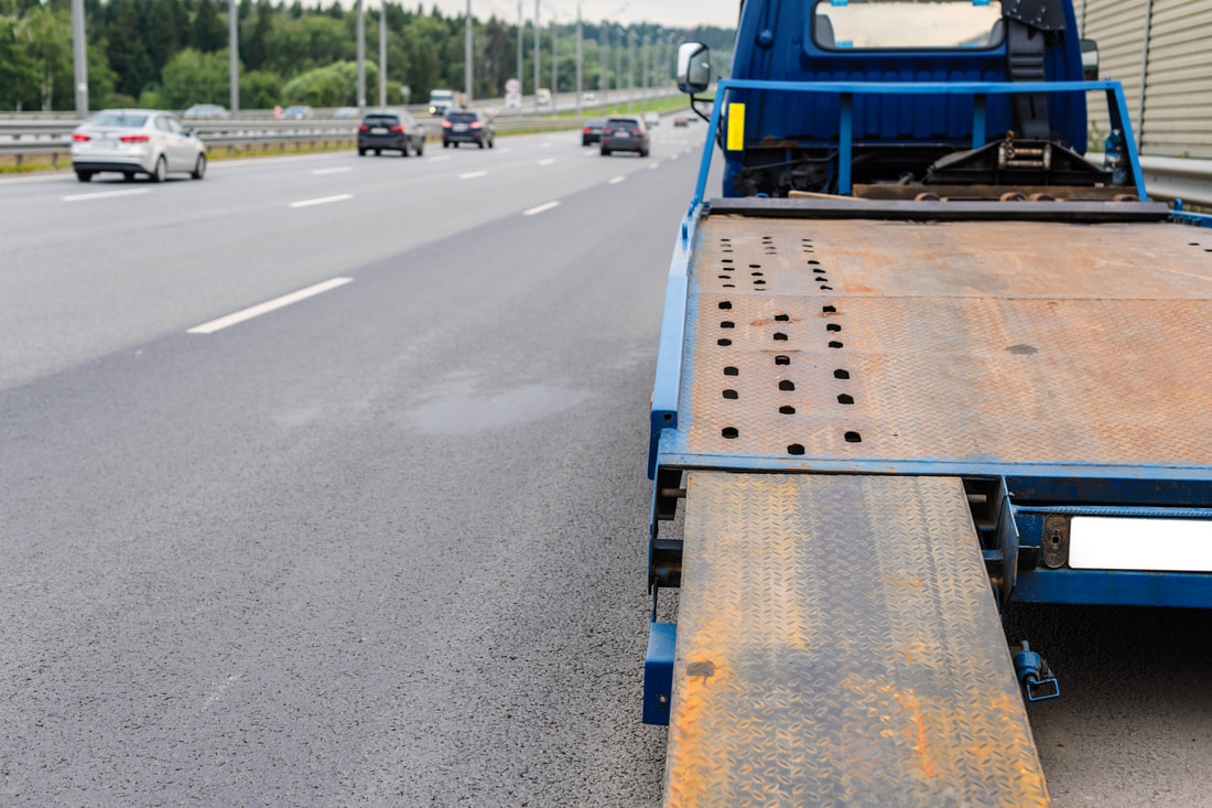 flatbed on highway near Brockton, MA