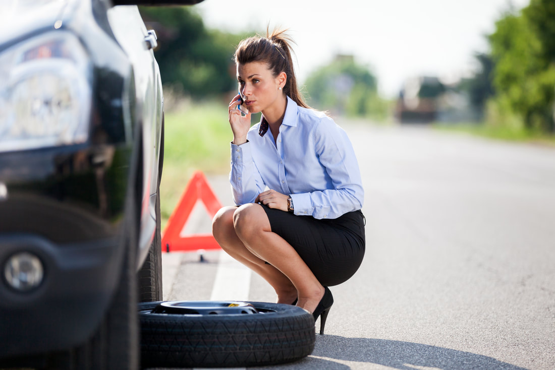 Woman car broke down calling a tow truck in brockton