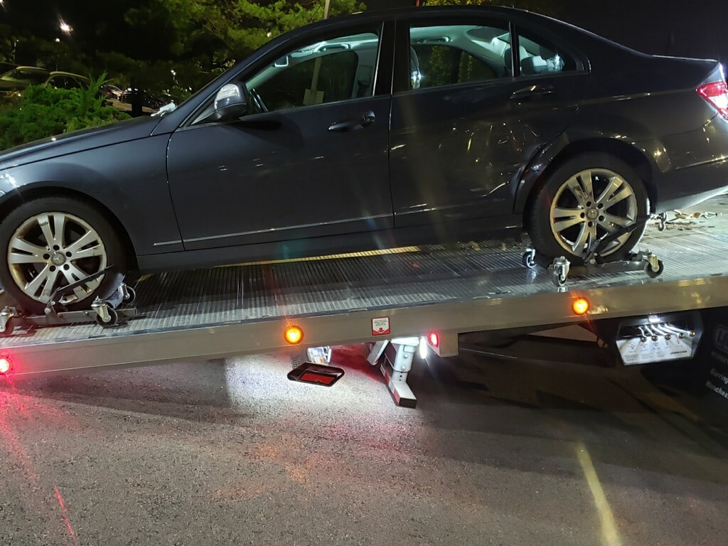 mercedes benz loaded on flatbed tow truck in abington, ma